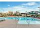 Community pool surrounded by contemporary residential buildings, offering a refreshing amenity for residents at 3206 Fountaintree Ave, Henderson, NV 89044