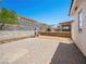 Paver patio and spacious backyard offers plenty of room for entertaining and outdoor activities at 3431 Cottage Thistle Dr, Laughlin, NV 89029