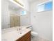 Bathroom with a large mirror and vanity, enclosed shower and ample natural light at 3431 Cottage Thistle Dr, Laughlin, NV 89029