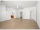 Large bedroom with tile flooring and doors, featuring access to other rooms at 3431 Cottage Thistle Dr, Laughlin, NV 89029