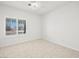 Bright bedroom with a ceiling fan and shuttered windows providing great sunlight at 3431 Cottage Thistle Dr, Laughlin, NV 89029