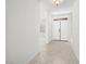 Bright foyer with tile flooring leading to a spacious living area, creating a welcoming entrance at 3431 Cottage Thistle Dr, Laughlin, NV 89029