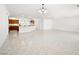 Bright living room with open layout, tile floors, and direct access to the kitchen area at 3431 Cottage Thistle Dr, Laughlin, NV 89029