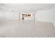 Expansive, open-concept living area featuring tile floors, high ceilings, and seamless flow to the kitchen at 3431 Cottage Thistle Dr, Laughlin, NV 89029