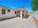 Covered patio and paver flooring create a relaxing outdoor living space at 3431 Cottage Thistle Dr, Laughlin, NV 89029