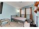 Bedroom with tile floor, storage and window with natural light at 3630 N Pecos Rd, Las Vegas, NV 89115