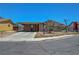 Charming single-story home with a covered parking and a well-maintained front yard in a suburban neighborhood at 3630 N Pecos Rd, Las Vegas, NV 89115