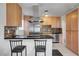 Contemporary kitchen with stainless steel appliances, elegant cabinetry, and a functional breakfast bar at 3630 N Pecos Rd, Las Vegas, NV 89115
