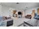 Open-concept living area, showcasing tile flooring and seamless flow into the kitchen and dining space at 3630 N Pecos Rd, Las Vegas, NV 89115