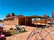 Expansive backyard with play area, turf, patio, and covered parking with endless potential at 378 W Thomas Ave, Overton, NV 89040