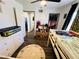 A ' room with alphabet rug, bunk bed, and fish tank at 378 W Thomas Ave, Overton, NV 89040