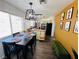 Modern dining area featuring dark wood table and stylish overhead lighting at 378 W Thomas Ave, Overton, NV 89040
