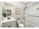 Bathroom with a shower over bath, single sink vanity, and a mirror at 390 Coastal Redwood St, Las Vegas, NV 89138
