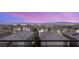 Stunning neighborhood view of city lights and mountain range at 390 Coastal Redwood St, Las Vegas, NV 89138