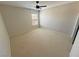 Neutral bedroom with a ceiling fan, window with blinds and carpet flooring at 3938 E Chaffe Ave, Pahrump, NV 89061