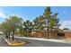 The Enclave at Burson Ranch gated community featuring mature trees, landscaping, and a well-maintained entrance at 3938 E Chaffe Ave, Pahrump, NV 89061