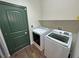 Laundry room features modern washer and dryer at 3938 E Chaffe Ave, Pahrump, NV 89061