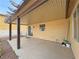 Relaxing covered patio with outdoor living space and easy access to the home at 3938 E Chaffe Ave, Pahrump, NV 89061