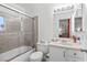 Bathroom with a shower-over-bath and a large mirror at 3941 Boca Grande Ave, Las Vegas, NV 89120