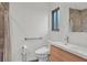 The bathroom has a modern vanity, toilet with bidet, accessible handrail, and tiled shower at 3989 Parkhaven Dr, Las Vegas, NV 89120