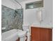 Full bathroom with a shower/tub combo and a modern vanity at 3989 Parkhaven Dr, Las Vegas, NV 89120