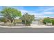 Charming single-story home with a well-manicured lawn and a welcoming front entrance at 3989 Parkhaven Dr, Las Vegas, NV 89120