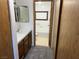 A clean bathroom featuring tile flooring, a vanity, and a shower-tub combination at 4121 Gannet Cir # 414, Las Vegas, NV 89103