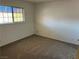 A cozy bedroom featuring neutral carpet and a window with natural light at 4121 Gannet Cir # 414, Las Vegas, NV 89103