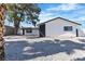 Ranch style home with xeriscape landscaping and mature trees at 4186 Toronto Cir, Las Vegas, NV 89121