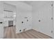 Laundry room with white walls, hard wood floors, and updated appliances at 4186 Toronto Cir, Las Vegas, NV 89121