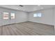 Bright open living space with wood floors and recessed lighting at 4186 Toronto Cir, Las Vegas, NV 89121