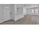 Bright, open floor plan with new light gray wood floors at 4186 Toronto Cir, Las Vegas, NV 89121