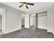 Bedroom featuring carpet flooring and an open mirrored closet at 433 Sellers Pl, Henderson, NV 89011
