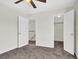 The bedroom includes carpet flooring and an open closet at 433 Sellers Pl, Henderson, NV 89011