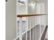 Upstairs hallway with carpet and railing at 433 Sellers Pl, Henderson, NV 89011