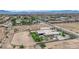 Private home with a long driveway, side yard, and expansive open space in the desert at 4455 W Ford Ave, Las Vegas, NV 89139