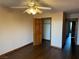 Cozy bedroom featuring wood flooring, closet, and ceiling fan at 4455 W Ford Ave, Las Vegas, NV 89139