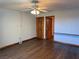Bedroom featuring a ceiling fan, wood floors, closet, and accent lighting at 4455 W Ford Ave, Las Vegas, NV 89139