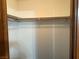 Walk-in closet with custom shelving and a hanging rod at 4455 W Ford Ave, Las Vegas, NV 89139