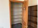 Walk-in closet featuring storage shelves and tile flooring at 4455 W Ford Ave, Las Vegas, NV 89139