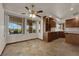 Charming dining area bathed in natural light, features tile flooring and ample cabinet space at 4455 W Ford Ave, Las Vegas, NV 89139