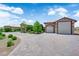 Driveway leading to the 3 car garage, the main house and guest house at 4455 W Ford Ave, Las Vegas, NV 89139