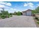 Long paver driveway leading to the home, guest house, and three car garage at 4455 W Ford Ave, Las Vegas, NV 89139