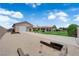 Beautiful home with a large garage, covered patio, well-maintained lawn, and desert landscaping at 4455 W Ford Ave, Las Vegas, NV 89139