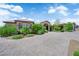 Beautiful single story home with a brick driveway and plenty of vegetation at 4455 W Ford Ave, Las Vegas, NV 89139