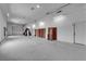 Spacious garage offers ample storage and workspace, and large overhead door at 4455 W Ford Ave, Las Vegas, NV 89139