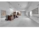 Spacious garage offers ample storage and workspace, and large overhead door at 4455 W Ford Ave, Las Vegas, NV 89139