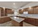 Updated kitchen has wood cabinets, granite countertops and stainless steel appliances at 4455 W Ford Ave, Las Vegas, NV 89139