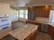 Kitchen with a breakfast nook and stainless steel appliances and granite counters at 4455 W Ford Ave, Las Vegas, NV 89139