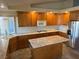 Stylish kitchen with granite countertops, stainless steel appliances, and an island for extra space at 4455 W Ford Ave, Las Vegas, NV 89139